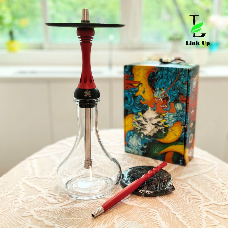 Handblown glass hookah on display in premium lounge setting