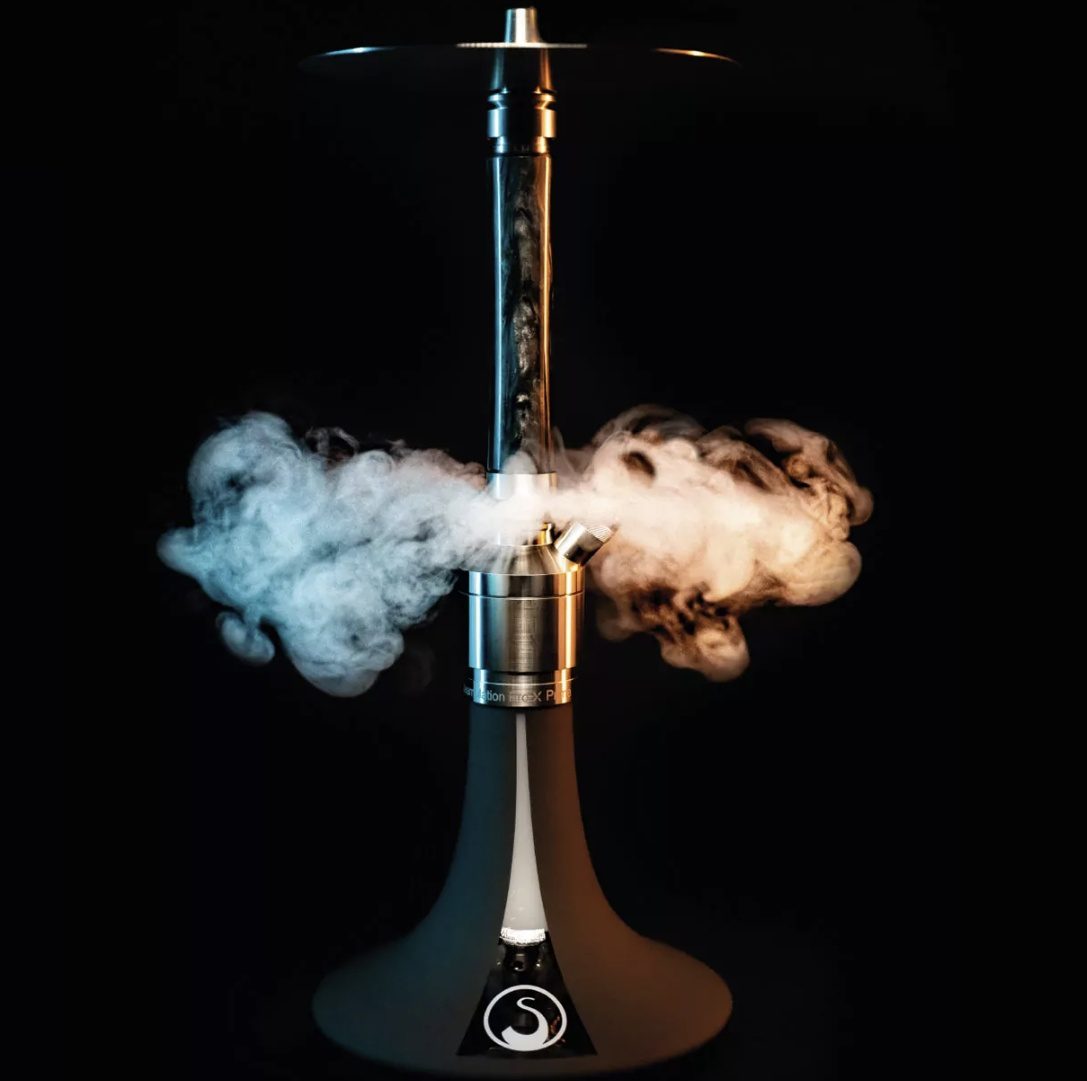 Vertical exhaust bottom smoke outlet showing smoke releasing downward from stem